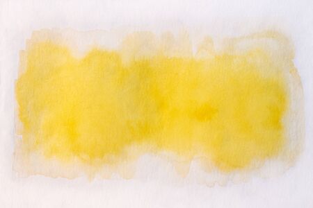 Hand painted yellow watercolor backgroundの写真素材