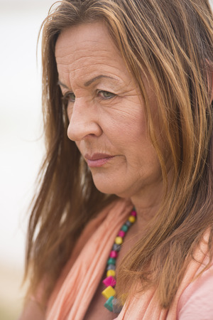 Portrait attractive senior woman with angry, stressed, sad, worried or depressed facial expressionの写真素材