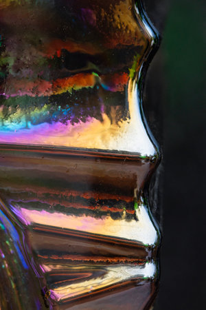 Closeup of a lantern in a Polish cemetry, holographic effect with a rainbow, background image.の写真素材