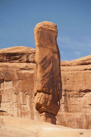 Balanced Rock Outcrop that resembles an Angry Man, Arches National Park, Moab, Utahの写真素材