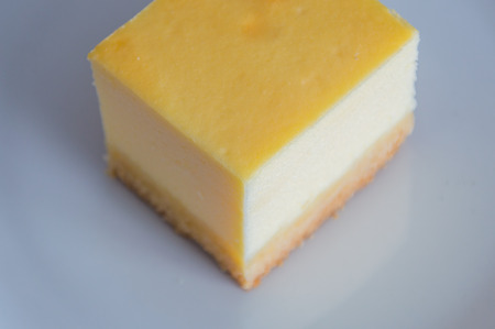 Cheesecake on white plate.の写真素材