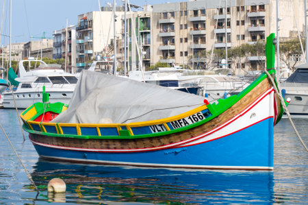 Malta - May 7, 2017: Traditional Maltase colorfull fishing boat.のeditorial素材