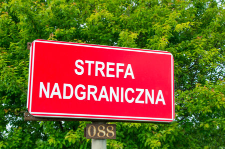 Pomeranian Voivodeship, Poland - June 17, 2017: Border area sign.のeditorial素材