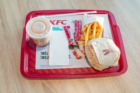 Gdansk, Poland - December 2, 2017: Grander Burger meal with drink and french fries at KFC (Kentucky...