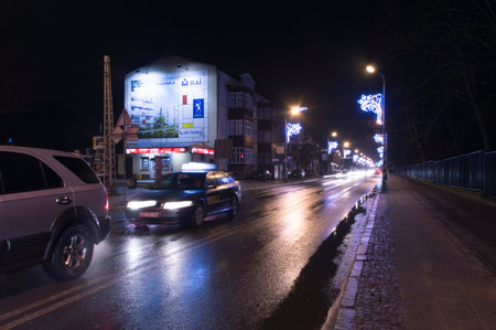 Gdansk, Poland - December 5, 2017: Road at Gdansk Oliwa at night in christmas time.のeditorial素材