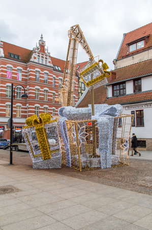 Gdansk, Poland - December 7, 2017: Gifts and crane as christmas decorations in the old town of Gdansk.のeditorial素材