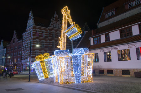 Gdansk, Poland - December 9, 2017: Gifts and crane as christmas decorations in the old town of Gdansk.のeditorial素材
