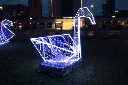 Gdynia, Poland - December 25, 2017: Illuminated swan as Christmas decoration at Grunwald place in Gdynia, Poland.のeditorial素材