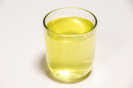 Sodium hypochlorite in glass. NaClO formula.の写真素材