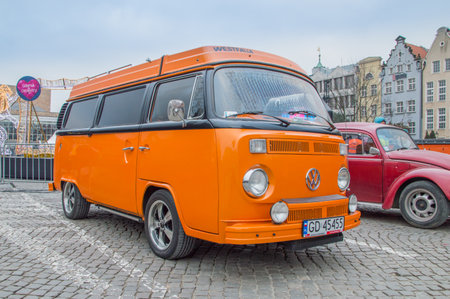 Gdansk, Poland - January 14, 2018: Orange historical Volkswagen Transporter at the Great Orchestra of Christmas Charity in Targ Weglowy in Gdansk.のeditorial素材