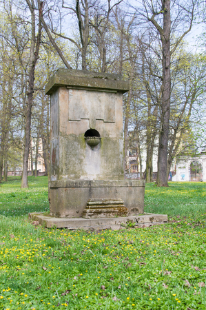 Old water fountain in Czartoryski Palace in Pulawy, Poland.の写真素材