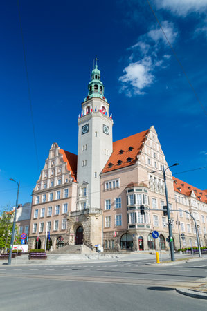 The New City Hall (built 1912-16) with Polish and EU flags on the tower.のeditorial素材