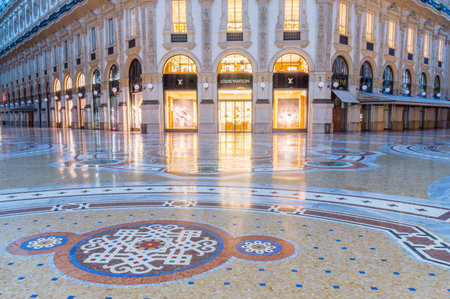 Milan, Italy - May 31, 2018: Louis Vuitton store in Galleria Vittorio Emanuele II at night.のeditorial素材