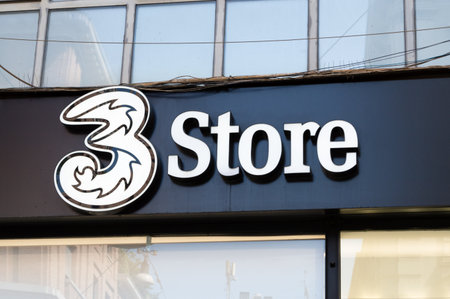 Milan, Italy - June 1, 2018:  3 mobile phone operator. A brand of CK Hutchison Holdingsのeditorial素材