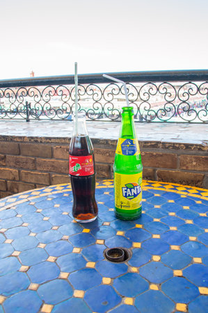 Marrakech, Morocco - June 4, 2018: Coca-Cola and Lemon Fanta with pipes for drink.のeditorial素材
