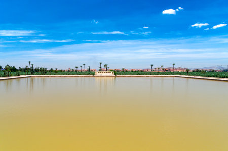 Marrakech, Morocco - June 5, 2018: Menara gardens pool in Marrakech, Morocco.のeditorial素材