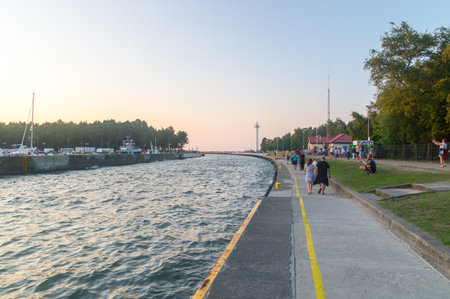Leba, Poland - June 27, 2018: Entrance to Leba Port on Baltic Sea in the evening.のeditorial素材