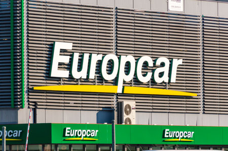 Berlin, Germany - August 16, 2018: Logo and sign of Europcar car rental company.のeditorial素材