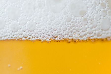 Close-up for beer and white foam.の写真素材