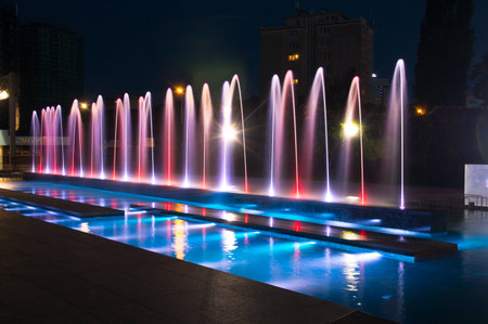 Gdansk, Poland - August 23, 2018: Water fountain at European Solidarity Centre at night.のeditorial素材