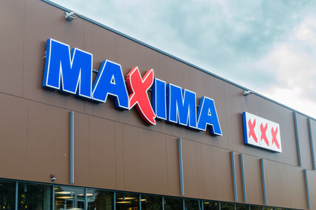 Vilnius, Lithuania - September 28, 2018: 
Maxima XXX logo and sign on the store. Maxima is a Lithuanian retail chain operating in Lithuania, Latvia, Estonia, Poland and Bulgaria.のeditorial素材