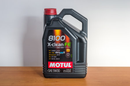 Pruszcz Gdanski, Poland - December 31, 2018: 5L plastic bottle of motor oil Motul 8100 X-Clean FE C2/C3 5W30.のeditorial素材