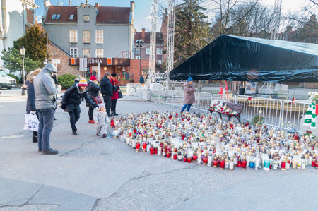 Gdansk, Poland - January 15, 2019: People and lots of candles after Pawel Adamowicz death. Pawel Adamowicz was Mayor of the city of Gdansk.のeditorial素材