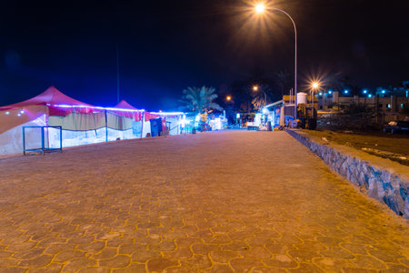 Aqaba, Jordan - February 8, 2019: Boulevard next to K. Hussein Street at night.のeditorial素材