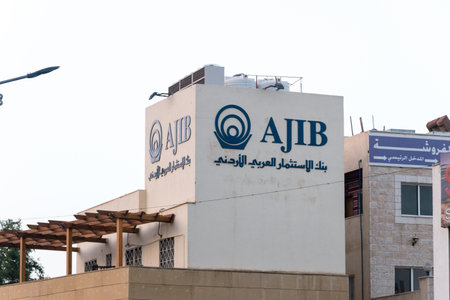 Aqaba, Jordan - February 8, 2019: Logo and sign of Arab Jordan Investment Bank.のeditorial素材