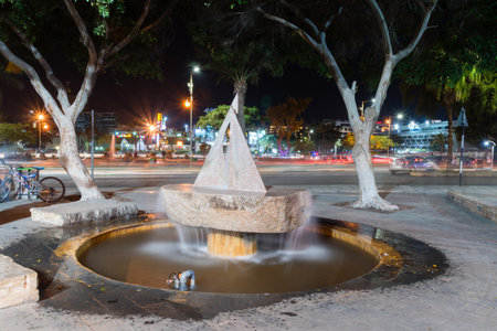 Aqaba, Jordan - February 8, 2019: Ship fountain at night next to Great Arab Revolt Circle.のeditorial素材