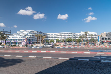 Eilat, Israel - February 9, 2019: Street view with Club Hotel Eliat in background.