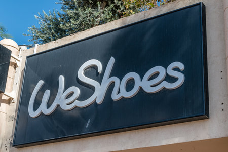 Eilat, Israel - February 9, 2019: Logo and sign of WeShoes. WeShoes is southern branch of the chain of shoe stores.のeditorial素材