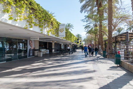 Eilat, Israel - February 9, 2019: Promenade with shops and restaurant in Eilat.のeditorial素材