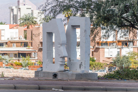 Eilat, Israel - February 9, 2019: View of faces sculptures at Derech HaGai street.のeditorial素材