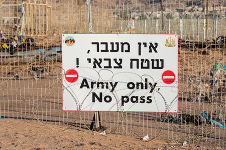 Eilat, Israel - February 9, 2019: Sign Army only, No pass. Sign on Israel border.のeditorial素材