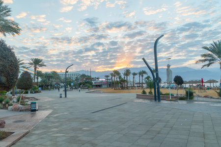 Eilat, Israel - February 10, 2019: Sunrise view at central beach in Eilat town. Eilat is famous resort and recreation city on Red Sea.のeditorial素材