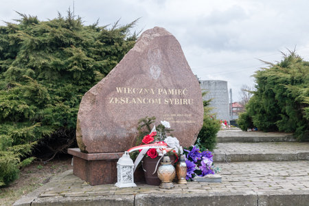 Deblin, Poland - February 20, 2019: Plaque commemorating the resettlers to Siberia.のeditorial素材