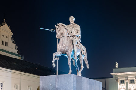 Warsaw, Poland - February 18, 2019: Monument to Prince Jozef Poniatowski in the courtyard of the Presidential Palace at night.のeditorial素材