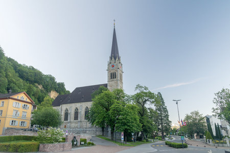 Vaduz, Liechtenstein - June 1, 2019: Center of Vaduz, looking to the cathedral.