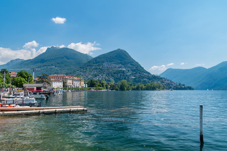 Lugano, Switzerland - June 1, 2019: The view of the mountains next to Lugano and lake Lugano (Lago di Lugano).のeditorial素材