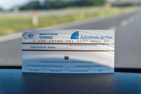 Turin, Italy - June 1, 2019: Toll ticket of highway Tronco A6 Torino - Savona.のeditorial素材