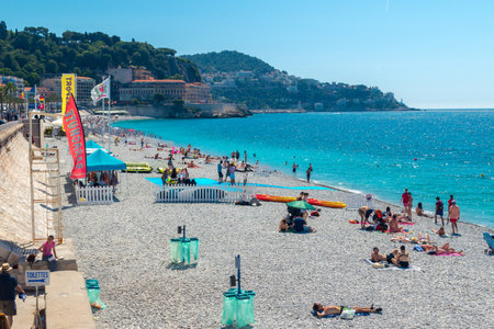 Nice, France - June 2, 2019: View of beach on Mediterranean Sea in Nice.のeditorial素材