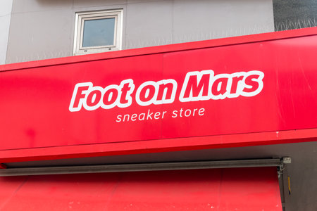 Andorra la Vella, Andorra - June 3, 2019: Close-up for logo and sign of Foot on Mars sneaker store.のeditorial素材