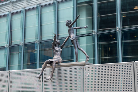 Brussels, Belgium - June 5, 2019: Girls sculpture outside the EU Charlemagne Building.のeditorial素材