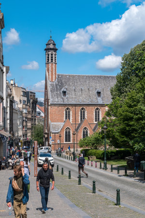 Brussels, Belgium - June 6, 2019: Rue de la Madeleine street with Maria Magdalenakerk church.のeditorial素材