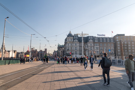 Amsterdam, Netherlands - June 6, 2019: View of city center of Amsterdam at Sint Nicolaasbrug street.のeditorial素材
