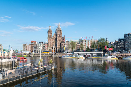Amsterdam, Netherlands - June 6, 2019: Basilica of Saint Nicholas view in the city of Amsterdam.のeditorial素材