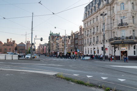 Amsterdam, Netherlands - June 6, 2019: View of Damrak street in the center of Amsterdam.のeditorial素材