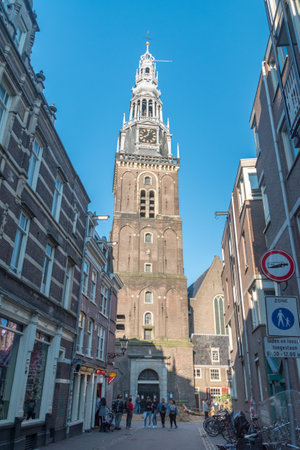 Amsterdam, Netherlands - June 6, 2019: Oudekerkstoren tower of Oude Kerk. Oude Kerk is Amsterdamâs oldest building and oldest parish church.のeditorial素材