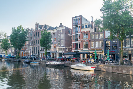 Amsterdam, Netherlands - June 6, 2019: View of a canal in Binnenstad. The Binnenstad is the medieval heart of Amsterdam.のeditorial素材